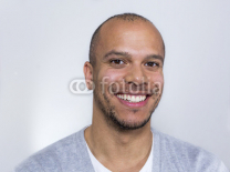 Portrait-of-a-man-in-a-tee-shirt-smiling-to-camera.jpg
